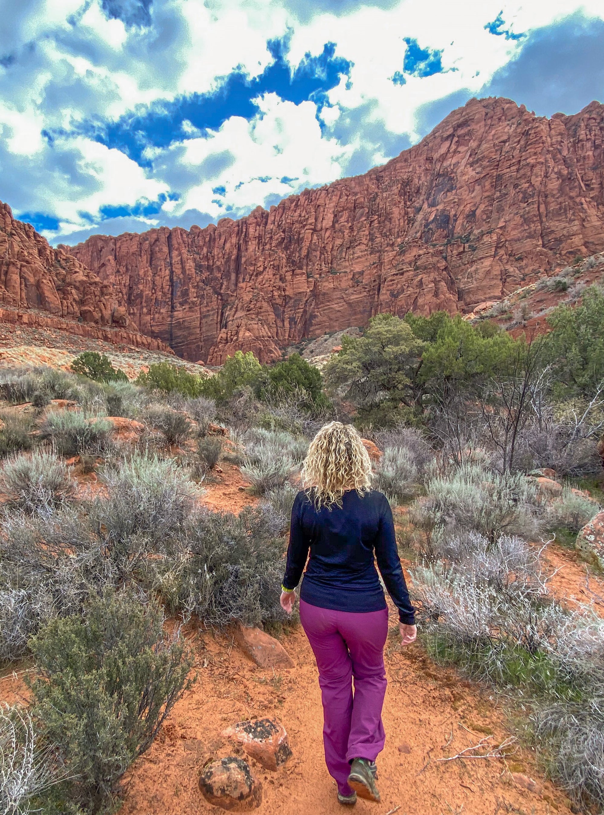 Arctix customer in hiking pants and base layer